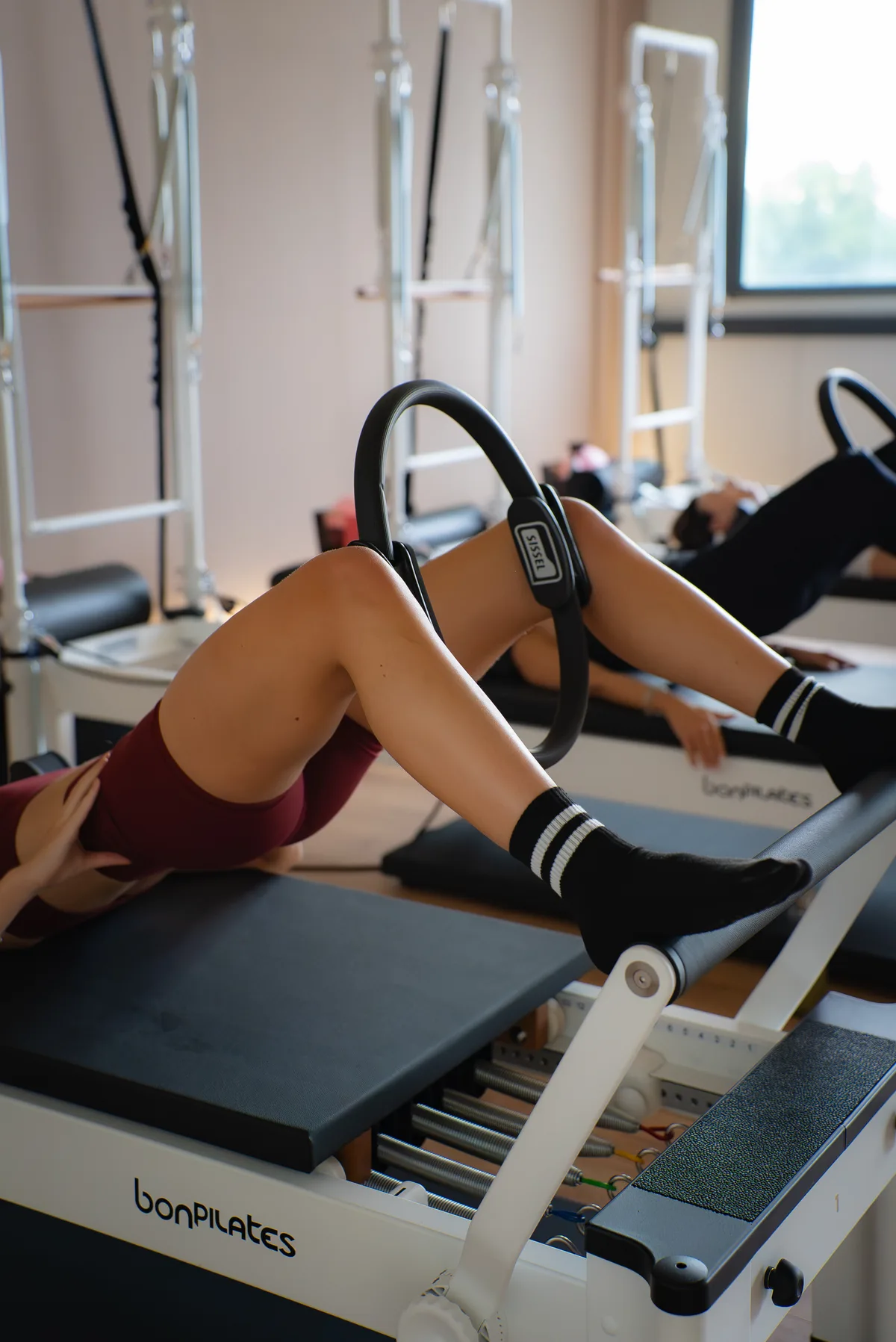 Travail au cercle magique en Pilates Reformer